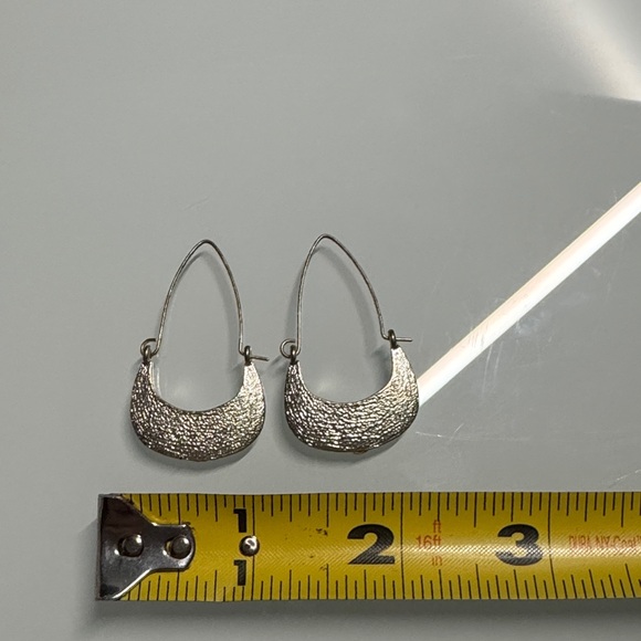 Elegant Silver Textured Earrings - Picture 2 of 4
